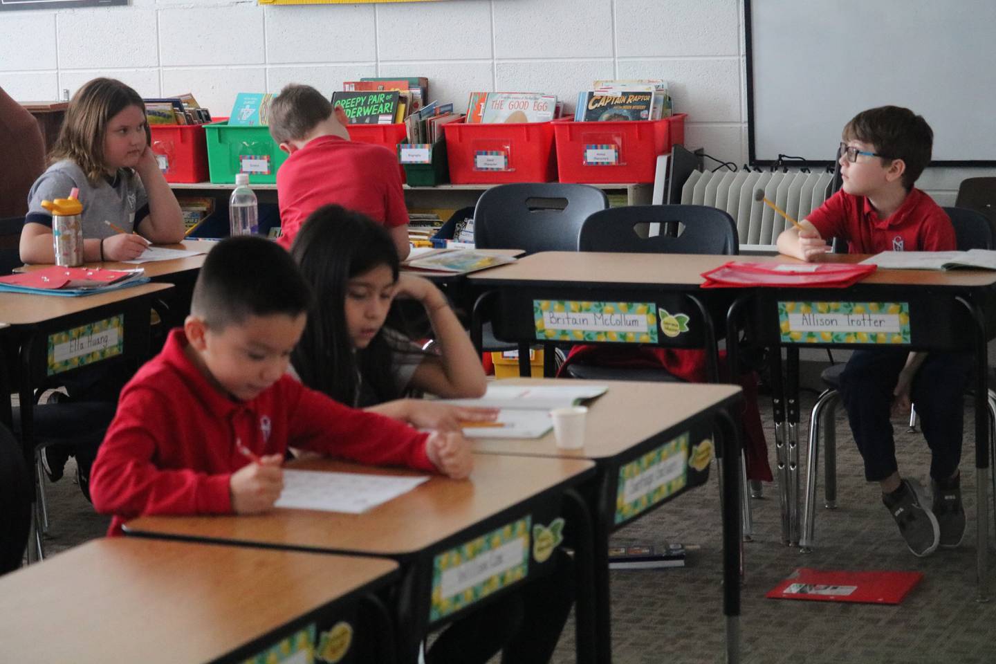 Students are seen Jan. 26, 2023 interacting with their teacher at St. Mary School.