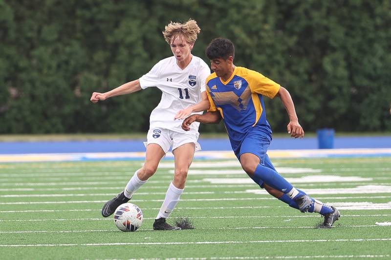 Plainfield South’s Grady Joy battles against Joliet Central ’s Javier Contreras on Tuesday, Sept. 5, 2023 in Joliet.