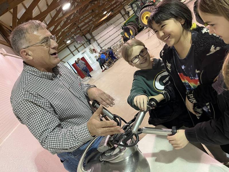 Tim Harris spoke to the students about Dairy. He explained the journey their milk takes from the cow at the farm to the glass on their tables. He also allowed showed the students how a milking machine worked.