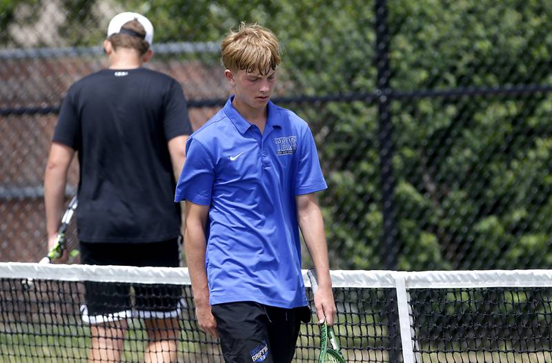 Lincoln-Way East’s Henry Phillips walks off the court after competing in the Class 2A Boys State Tennis Tournament on Thursday, May 29, 2025, at Fremd High School, in Palatine.