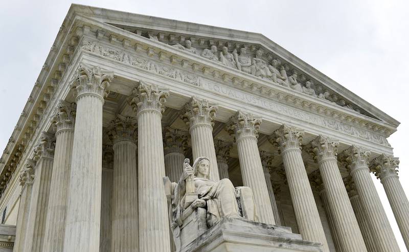 This photo taken Friday, Oct. 3, 2014, shows the U.S. Supreme Court in Washington. A Supreme Court term that is starting Monday, Oct. 6, 2014, with a lack of headline-grabbing cases may end with a blockbuster that helps define the legacy of the court under Chief Justice John Roberts. That's because the justices appear likely to take on the issue of same-sex marriage and decide once and for all whether gay and lesbian couples have a constitutional right to marry.  (AP Photo/Susan Walsh)