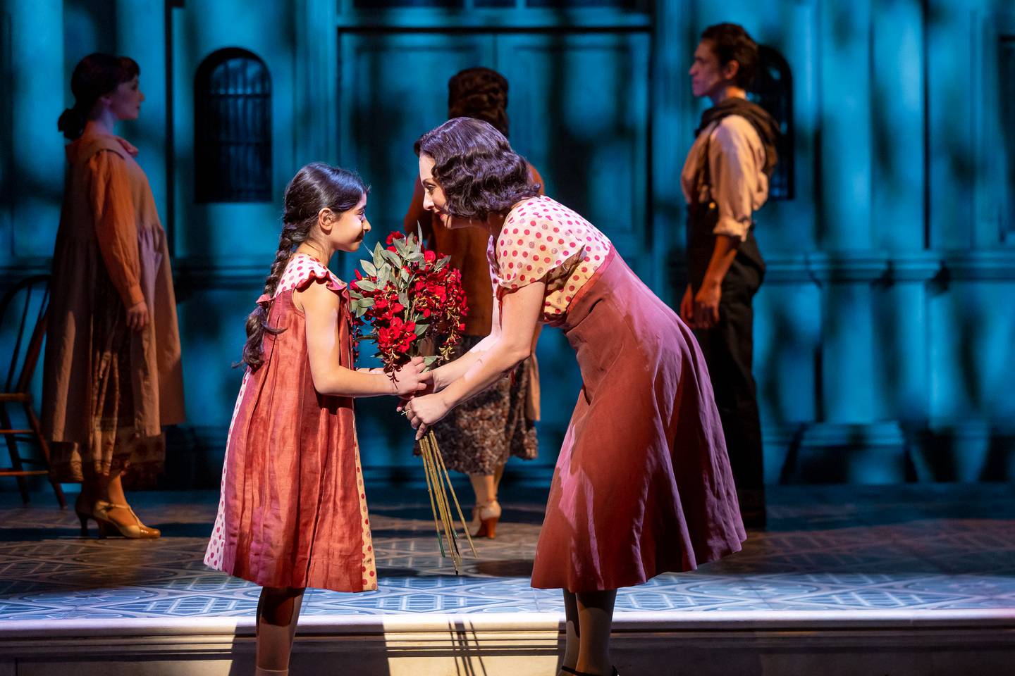 Nina Poulimas (Young Eva) and Michelle Aravena (Eva) star in the Tony Award-winning musical about the life of Eva Peron, "Evita," playing at Drury Lane Theatre in Oakbrook Terrace through March 20.
