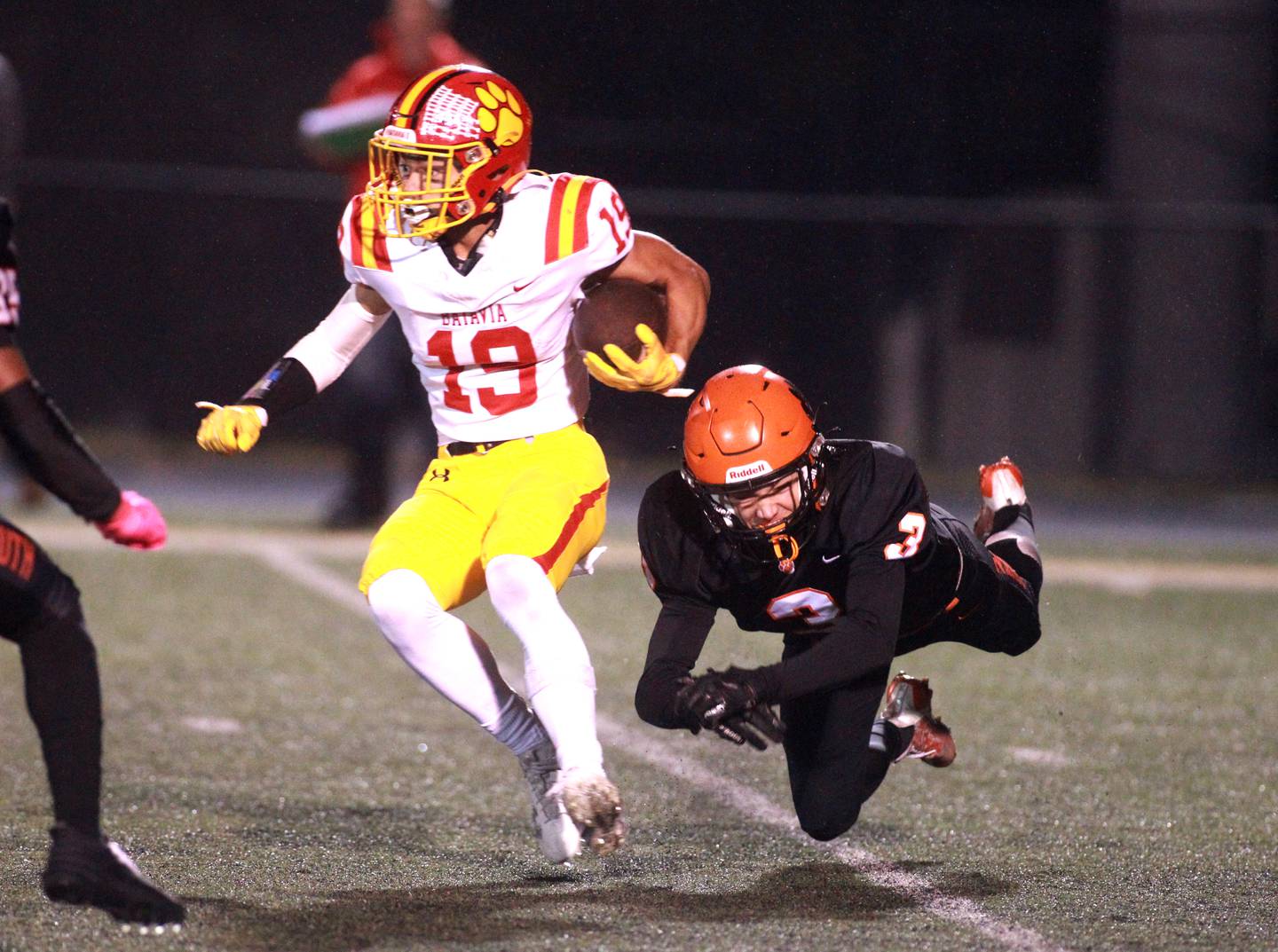 Batavia’s Zach Granberg gets past Wheaton Warrenville South’s Connor Sliwa during a game in Wheaton on Friday, Oct. 13, 2023.