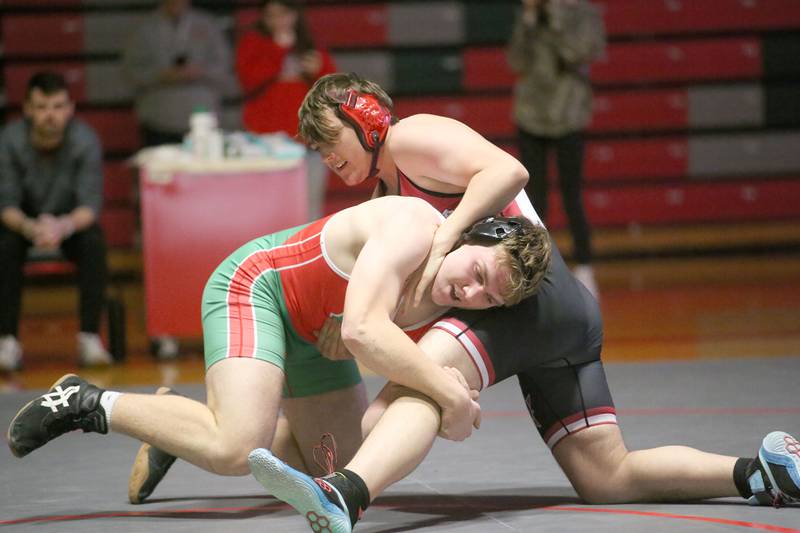 Ottawa's Jordan Fuller wrestles L-P's Endrew Sell on Thursday, Jan. 9, 2025 in Sellett Gymnasium at L-P High School.