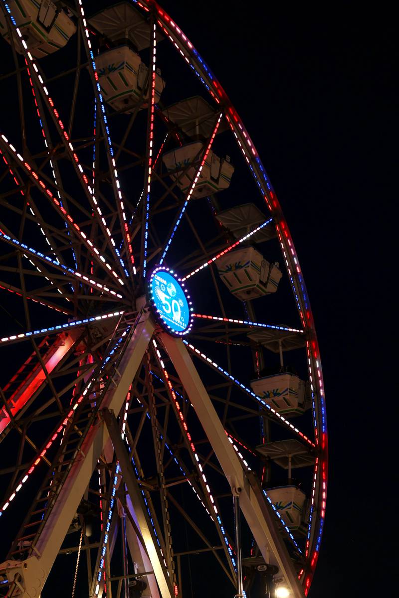 The 50th anniversary of the Bourbonnais Friendship Festival is commemorated on the ferris wheel, provided by Luehrs’ Ideal Rides, during the festival at The Grove on Saturday, June 28, 2025.