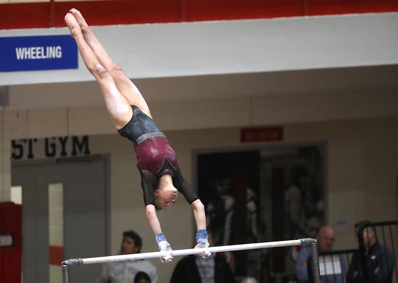 Prairie Ridge Co-op’s Bryleigh Cooper competes in the preliminary round of the parallel bars on Friday, Feb. 20, 2026, during the IHSA Girls State Final Gymnastics Meet at Palatine High School.