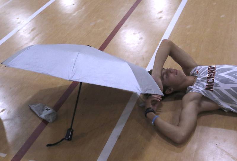 After the pole vault was moved indoors McHenry’s Zachary Galvicius waits to start his vaulting on the way to winning the pole vault Friday, May 12, 2023, during the Fox Valley Conference Boys Track and Field Meet at Huntley High School.