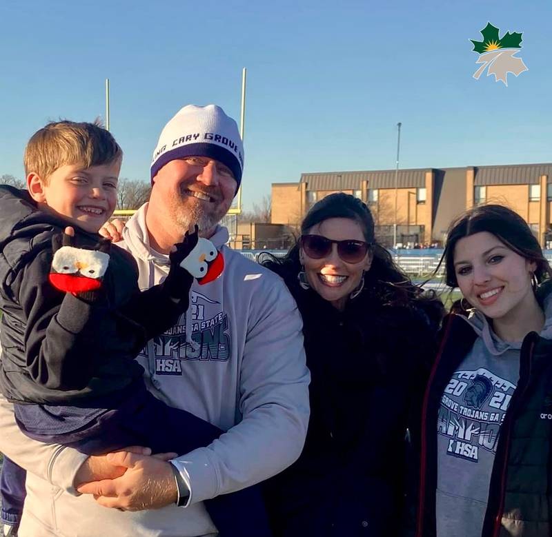 Former Cary-Grove defensive coordinator Matt Furlong, holding son Bryant, with his wife Monica and daughter Makenzy, is Geneseo's new head football coach.