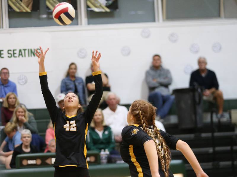 Putnam County's Eme Bouxsein sets the ball in the air for teammate Maggie Spratt on Tuesday, Sept. 24, 2024 at St. Bede Academy.