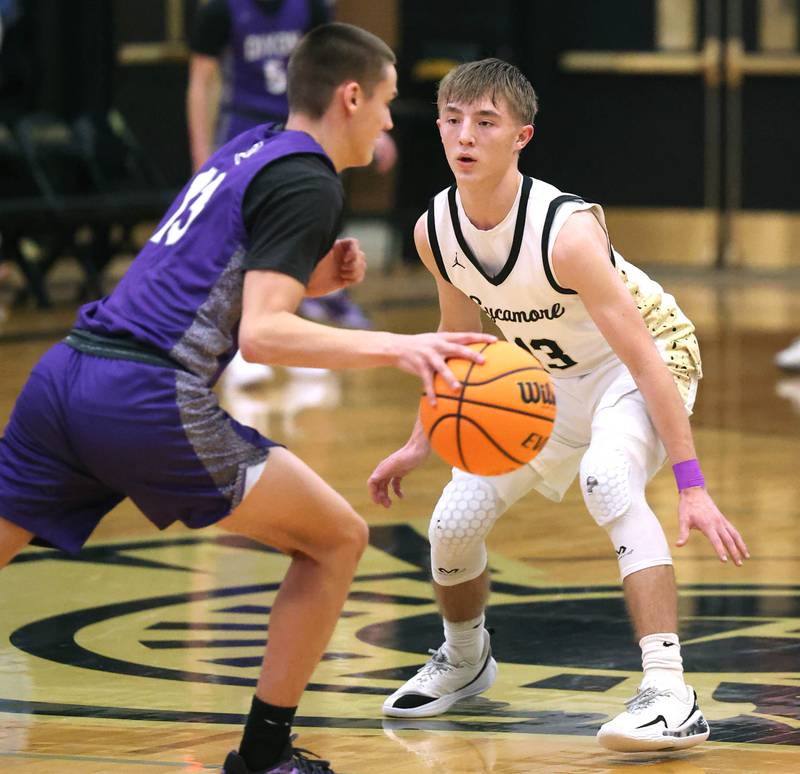 Sycamore's Xander Lewis plays defense against Dixon’s Cullen Shaner during their game Tuesday, Jan. 14, 2025, at Sycamore High School.