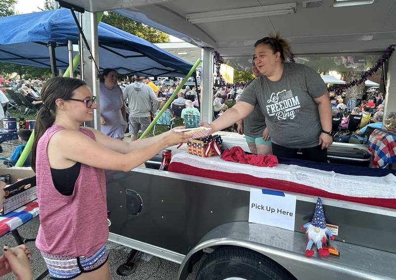 Jennifer Robinson and Tiffany West were busy selling sandwiches and soft drinks at the Let Freedom Ring booth at the Mt. Morris Jamboree on Friday, June 20, 2025. Proceeds are used toward the annual Fourth of July celebration, Let Freedom Ring, in Mt. Morris. This year's event will be held July 2-5.