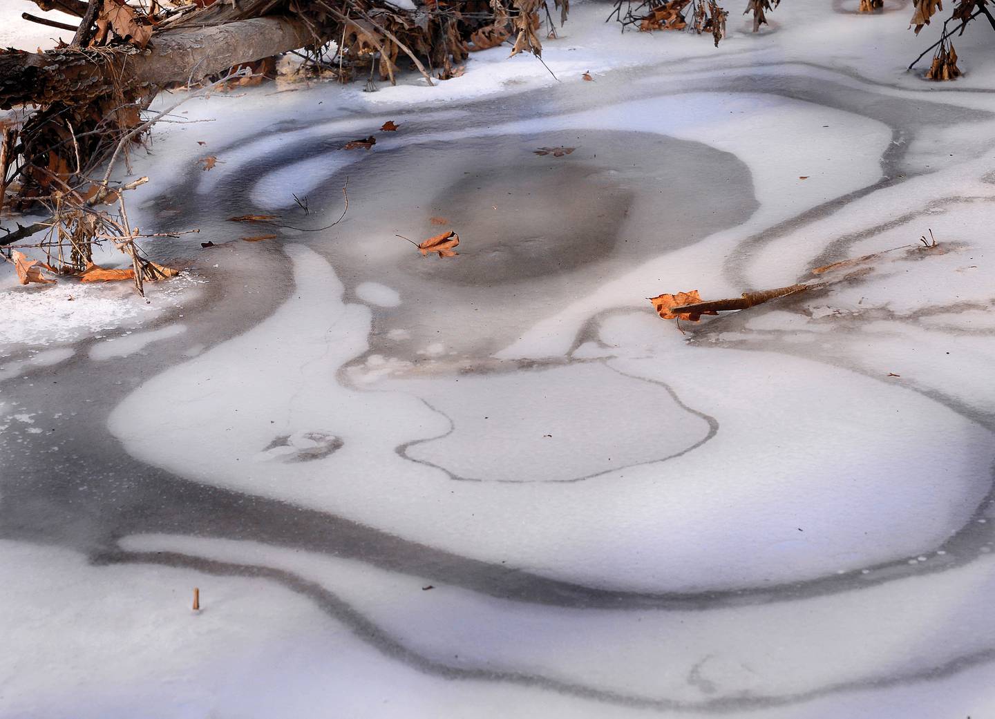 Ice forms a swirling pattern at Starved Rock State Park.