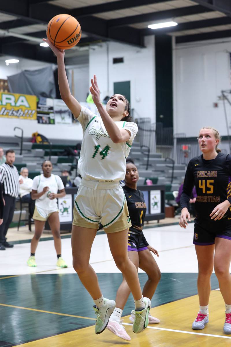 Bishop McNamara's Jaide Burse goes for a layup during the Fightin' Irish's 67-27 victory over Chicago Christian on Monday, Jan. 26, 2026.