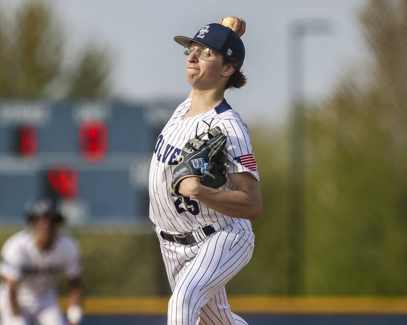 Oswego East's Dylan Baker (25) delivers a pitch during baseball game between Plainfield North at Oswego East, Monday, April 28, 2025 in Oswego.