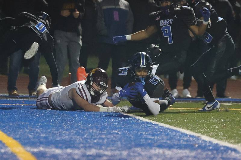 Lincoln-Way East’s Justin Titus intercepts the ball at the one yard line resulting in a touchback against Loyola in the Class 8A semifinal on Saturday, Nov. 23, 2024 in Frankfort.