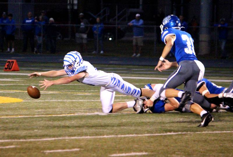 Princeton’s William Lott reaches for Princeton's fumbled ball during a game at Newman on Friday, Sept. 8, 2023.