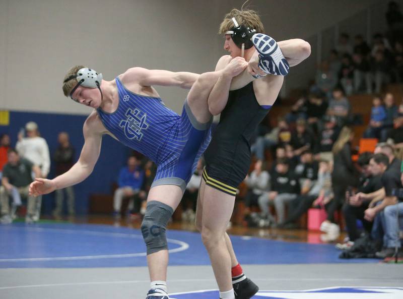 Newman's Briar Ivey wrestles Riverdale's Blake Smith during the 61st annual Lyle King wrestling tournament on Saturday, Jan. 11, 2024 at Princeton High School.