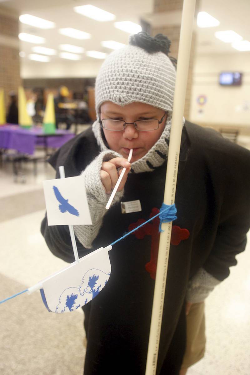 Brick Schiola-Wililams, 11, of DeKalb, participates in one of 16 activities at DeKalb Public Library's Fantasy Fest on Oct. 4.