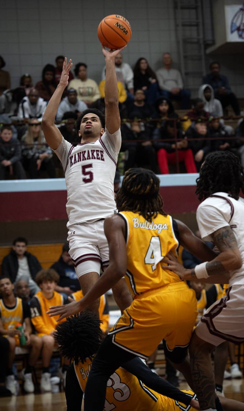 Kankakee's EJ Hazelett elevates for a shot in a game against Richards in the Kankakee Holiday Tournament at Kankakee High School on Saturday, December 27, 2025.