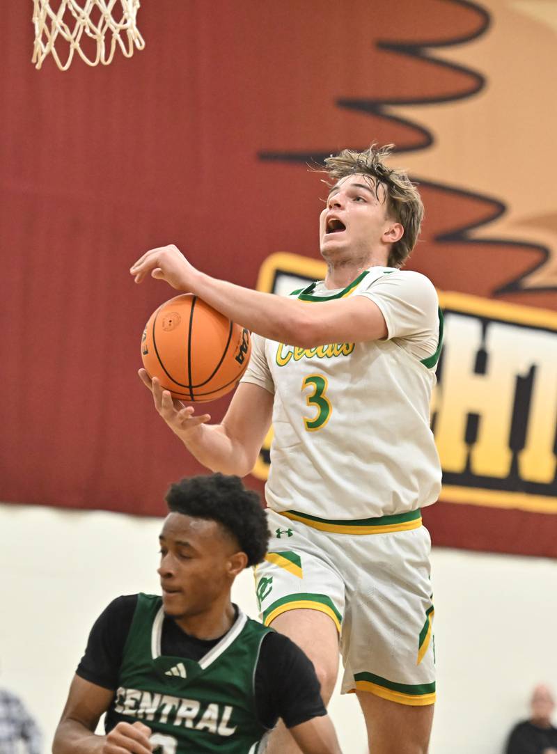 Providence Catholic's Luke Rost (3) goes up for a shot during the WJOL tournament game against Plainfield Central on Friday, NOV. 28, 2025, at Joliet.