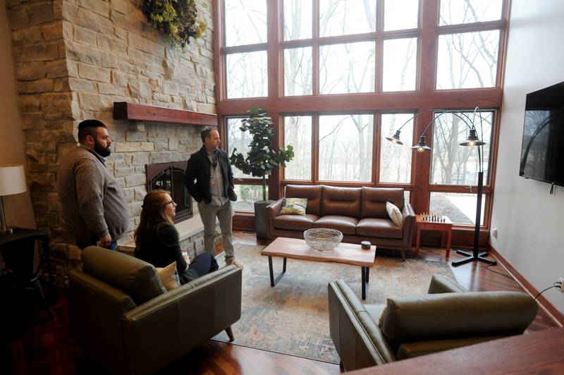 Staff members look at the atrium area as they prepare for the opening of the new Northern Illinois Recovery Center, 2602 Route 176, Prairie Grove, on Tuesday, March 22, 2022.