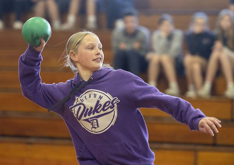 Ophelia Lumzy, seventh grader from St Annes, loads up a throw Monday, Jan. 26, 2026, during the Deanery Dodgeball tournament.