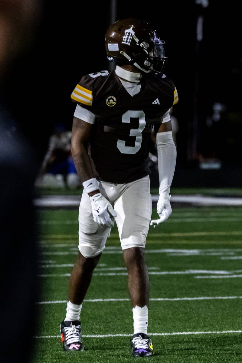 Joliet Catholic's Jayden Armstrong looks down field during a varsity football game against Lyons Township at Busey Bank Field at Joliet Memorial Stadium on Aug. 29, 2025.