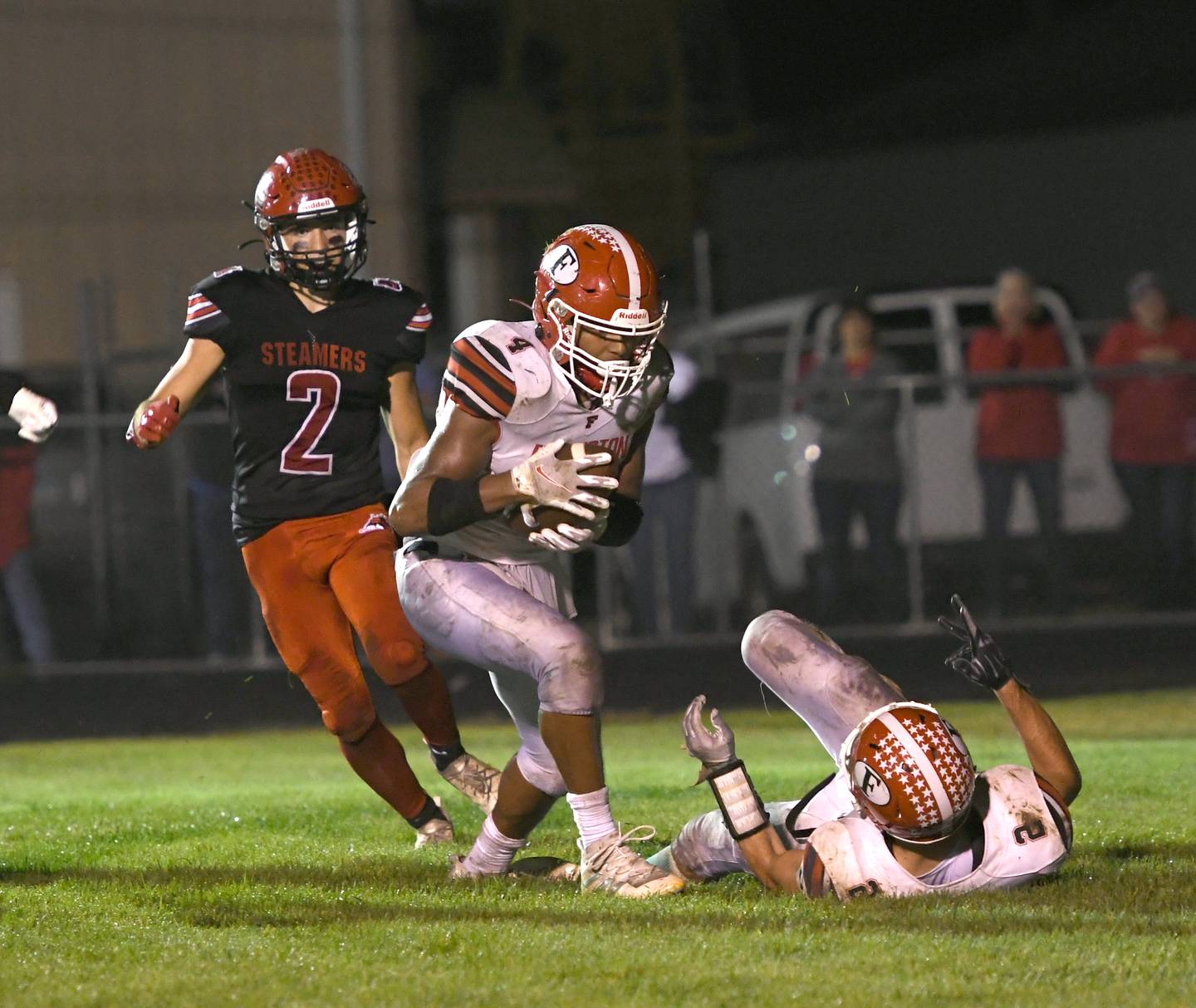 Forreston's Noah Johnson catches a deflection by Matthew Betran in Fulton's endzone.