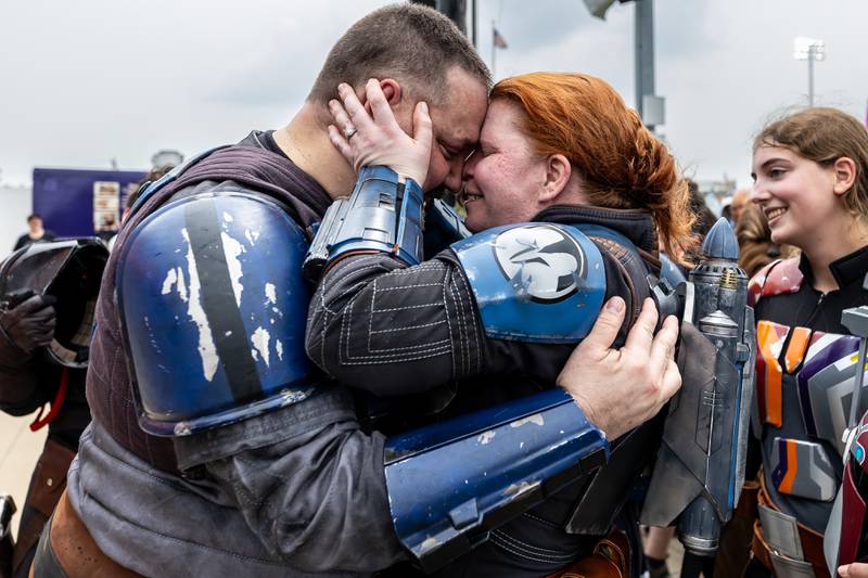 Stephen Townsend and Mara Jones embrace after getting engaged during Joliet Public Library's Star Wars Day event on June 7, 2025.