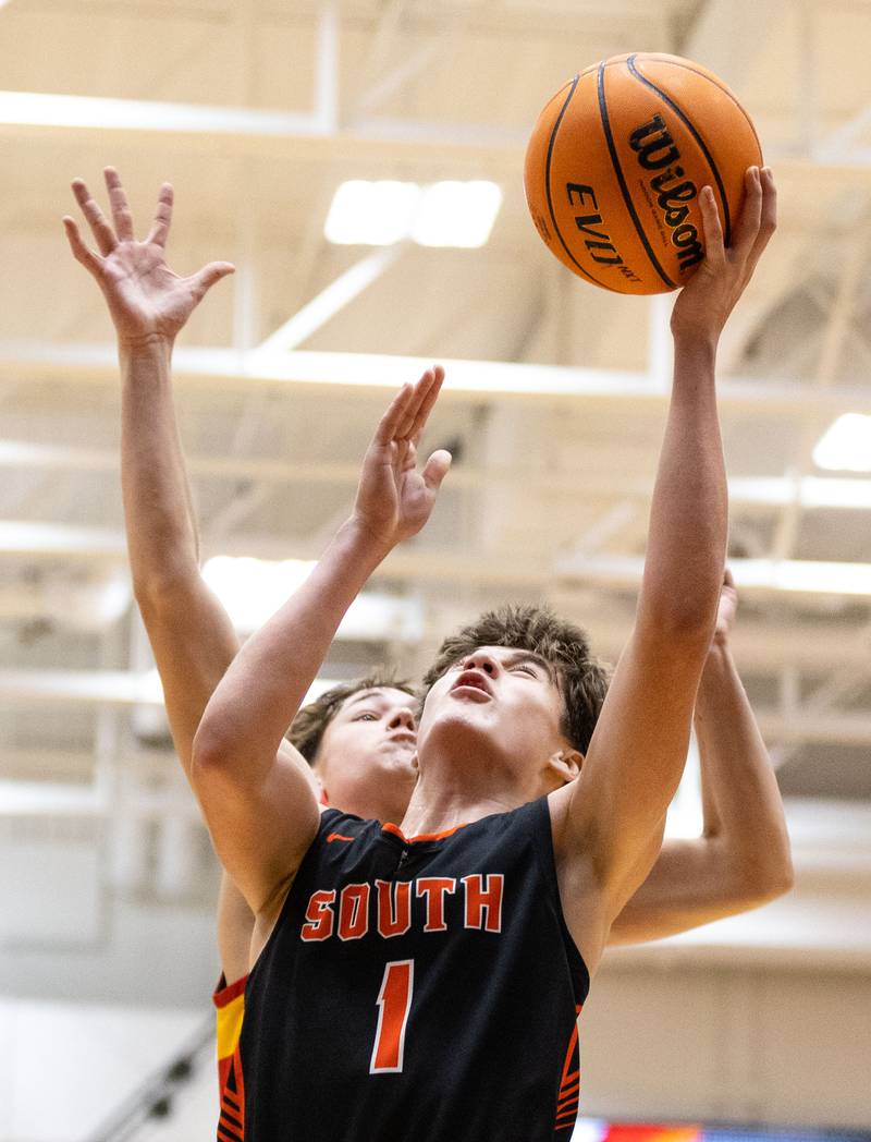 Wheaton Warrenville South’s Brady McClatchy goes up for a layup during an away game against Batavia on Tuesday, Jan. 7, 2025.