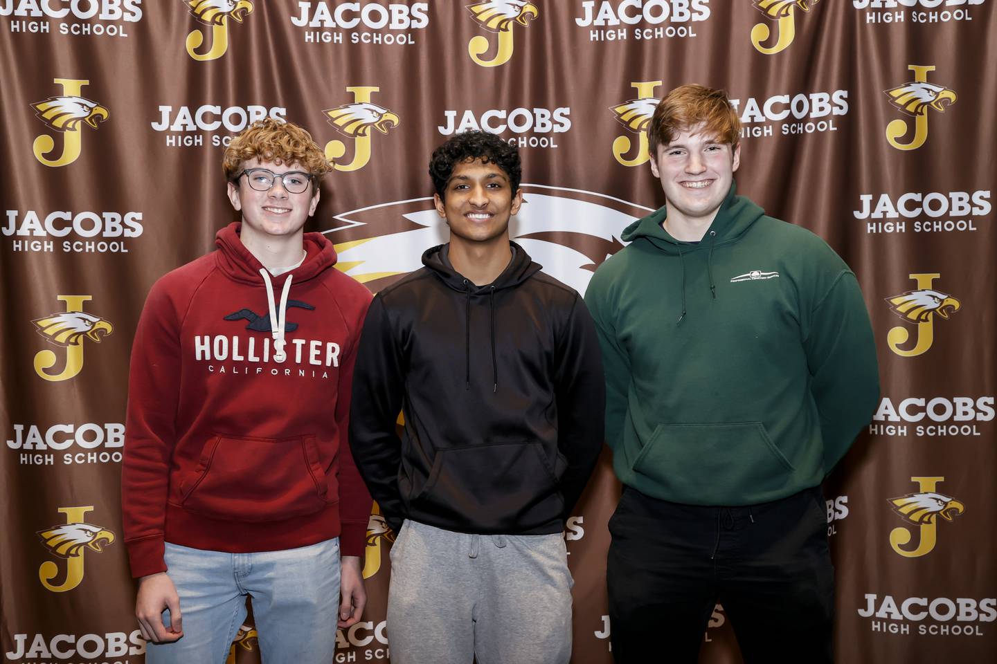Jacobs football players Dylan Christopherson (left) and Will Seibert (right) were named Bears Community All-Star award winners. Anay Patel (middle), a Jacobs baseball player, also is one of the founders of Athletes 4 Athletes, which gets equipment to youth athletes who need it.