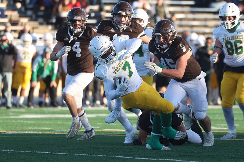 Providence’s Jamari Tribett spins off a tackle for extra yards against Joliet Catholic in the Class 5A semifinal on Saturday, Nov. 18, 2023, in Joliet.