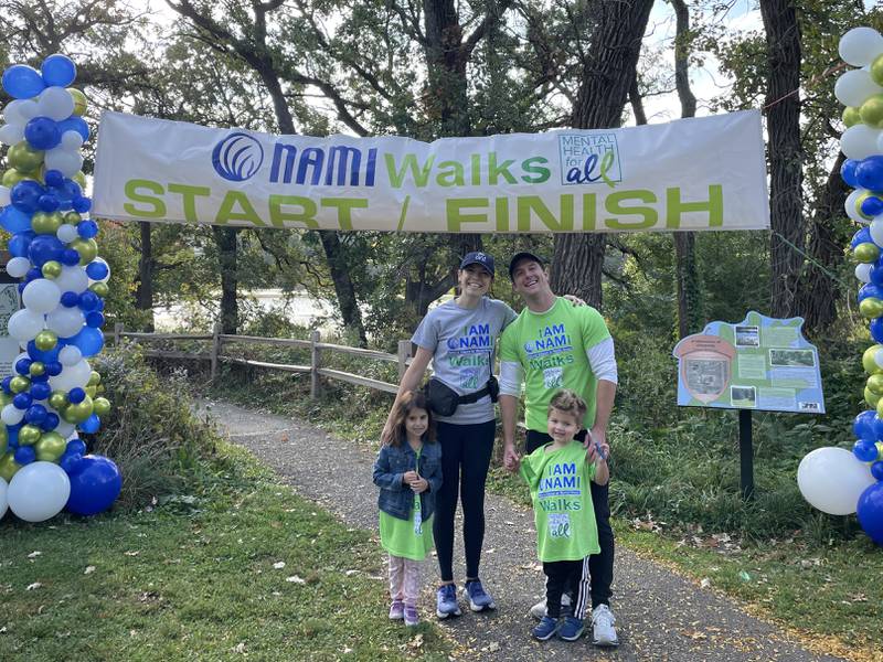 NAMI of McHenry County Executive Director Abbey Nicholas participates in the NAMIWalks 2024 with husband Kyle and their two children.