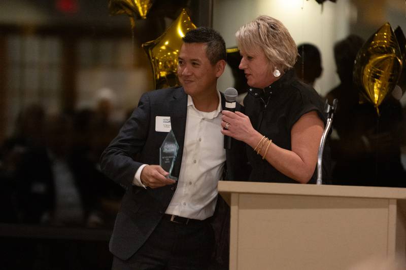Vu Nguyen accepts the Volunteer of the Year Award on behalf of US Bank at the Geneva Chamber of Commerce Awards Dinner on Thursday, Nov. 6, 2025 in Geneva.
