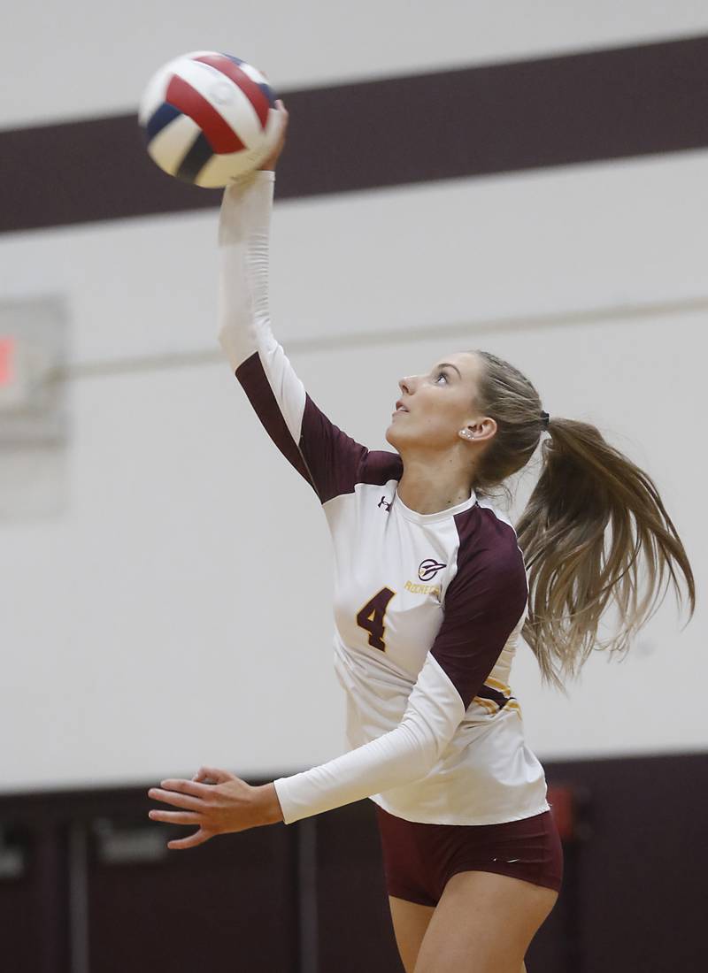Richmond-Burton's Daniella Hopp serves the ball during a Kishwaukee River Conference volleyball match against Woodstock North on Wednesday, Oct. 15, 2025, at the Richmond-Burton High School in Richmond.
