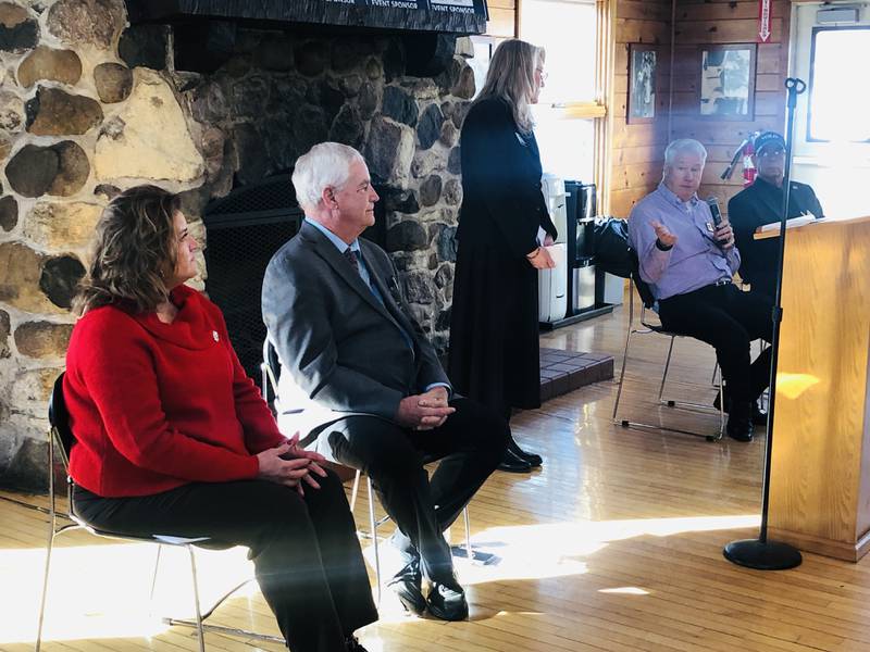 Village presidents, from seated from left, Toni Wardanian, Donny Schmit, Mark Eisenberg and Steve Henley, answer audience questions posed by Chain O' Lakes Chamber of Commerce board member Kathrine Pfister on Jan. 17, 2023.