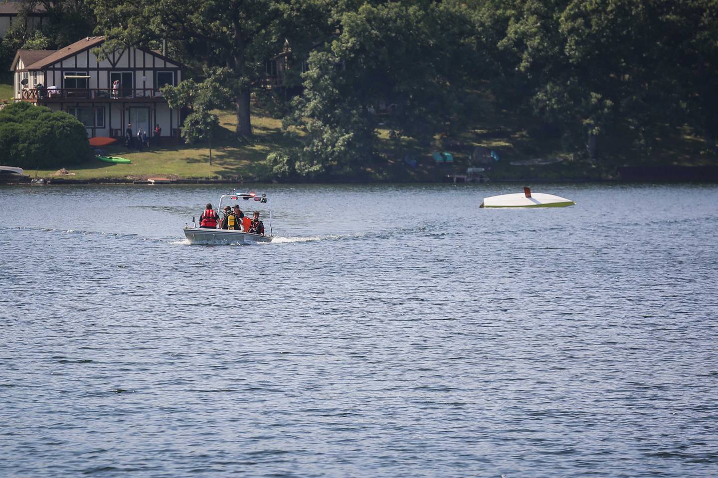 A man was rescued from Silver Lake after his sailboat tipped over on Thursday morning in Oakwood Hills.
