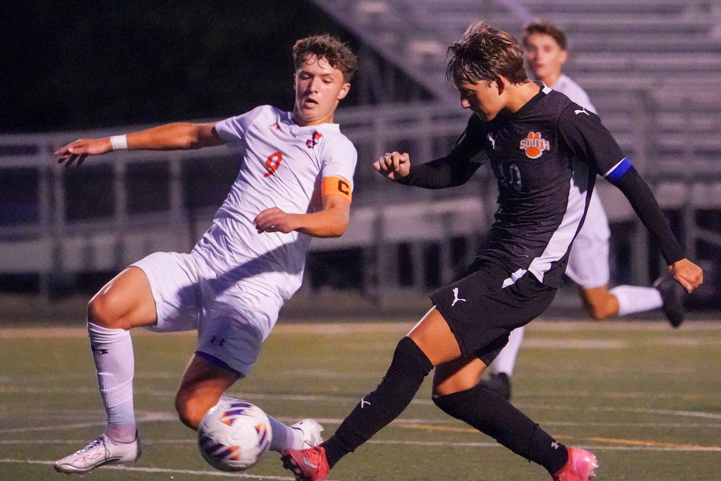 Wheaton Warrenville South’s Semin Razman (10) scores his second goal of the game off a shot against Oswego’s Dustin King (9) during a soccer match at Wheaton Warrenville South in Wheaton on Thursday, Aug 28, 2025.