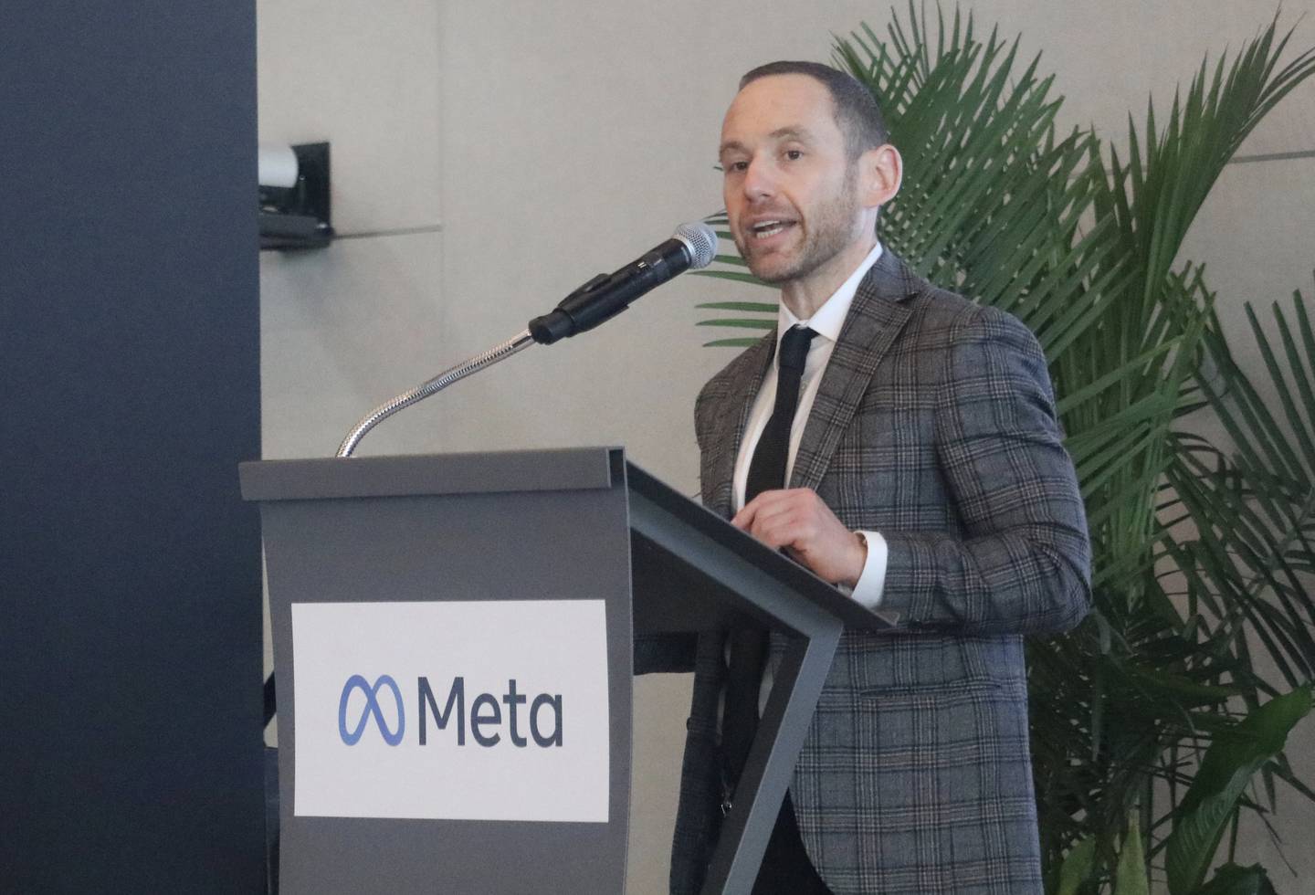 Brad Davis, Meta's director of dada center community and economic development, speaks in DeKalb on Wednesday, Nov. 29, 2023, at a grand opening ceremony to celebrate the Meta DeKalb Data Center coming online. Once fully operational, the campus will house more than 2.3 million square feet across five buildings. The data center at 2050 Metaverse Way marks more than $1 billion investment in DeKalb.