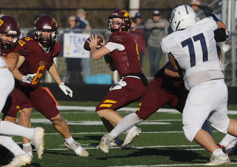 Richmond-Burton's Ray Hannemann drops back to pass during an IHSA Class 3A quarterfinal playoff football game against Monmouth-Roseville on Saturday, November 15, 2025, at Richmond-Burton High School, in Richmond.
