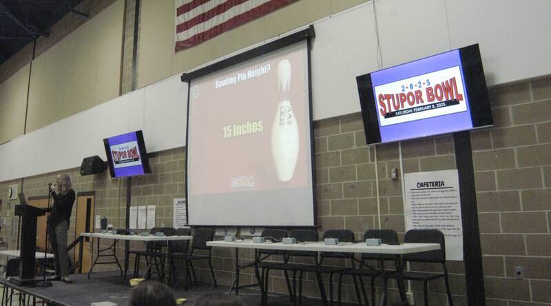 Answers are projected on the big screen at the Stupor Bowl. The event was held Saturday, Feb. 8, at Reagan Middle School in Dixon.