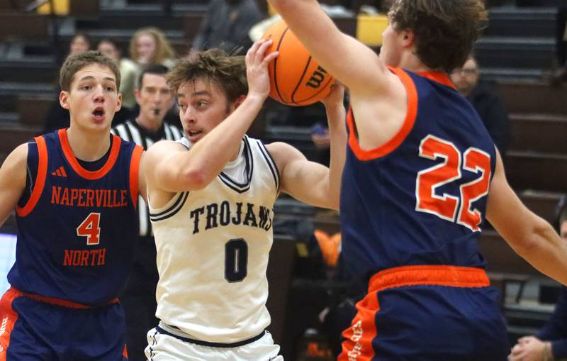 Cary-Grove’s Brandon Freund looks for an option against Naperville North in varsity boys basketball Hinkle Holiday Classic action on Monday, Dec. 21, 2025, at Jacobs High School in Algonquin.