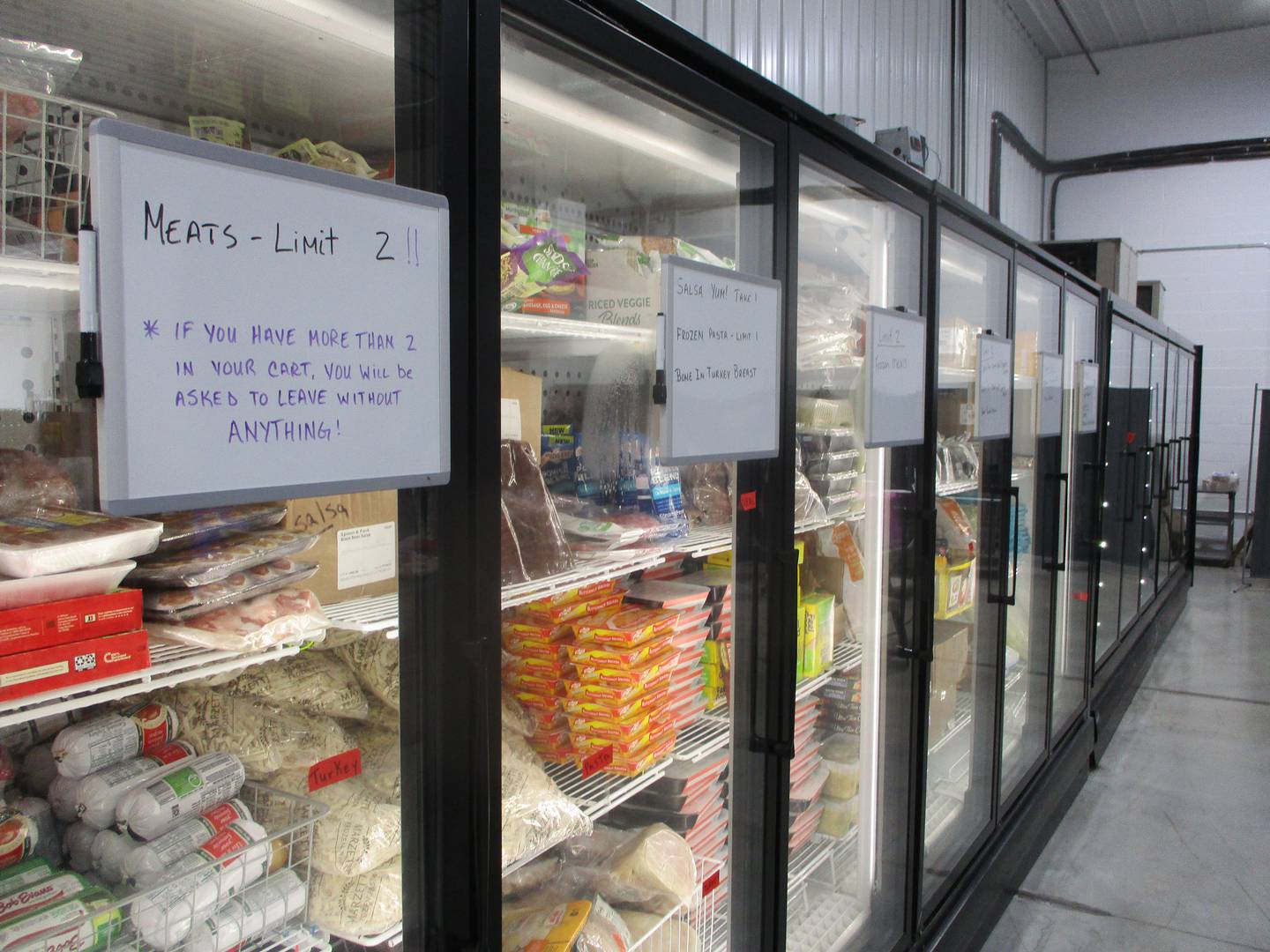 The Sharefest free grocery store in New Lenox has a freezer for meat and frozen food items and a cooler for dairy and other food that must be kept cold.