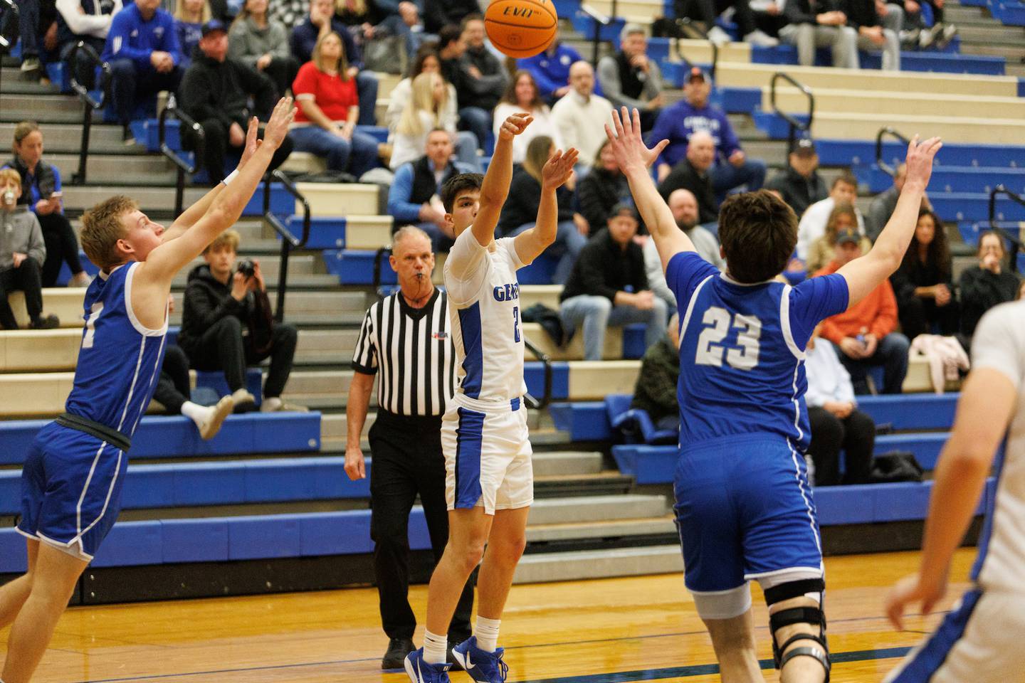 Geneva's Gabe Jensen shoots a three pointer against Wheaton North on Friday, Feb.13,2026 in Geneva.