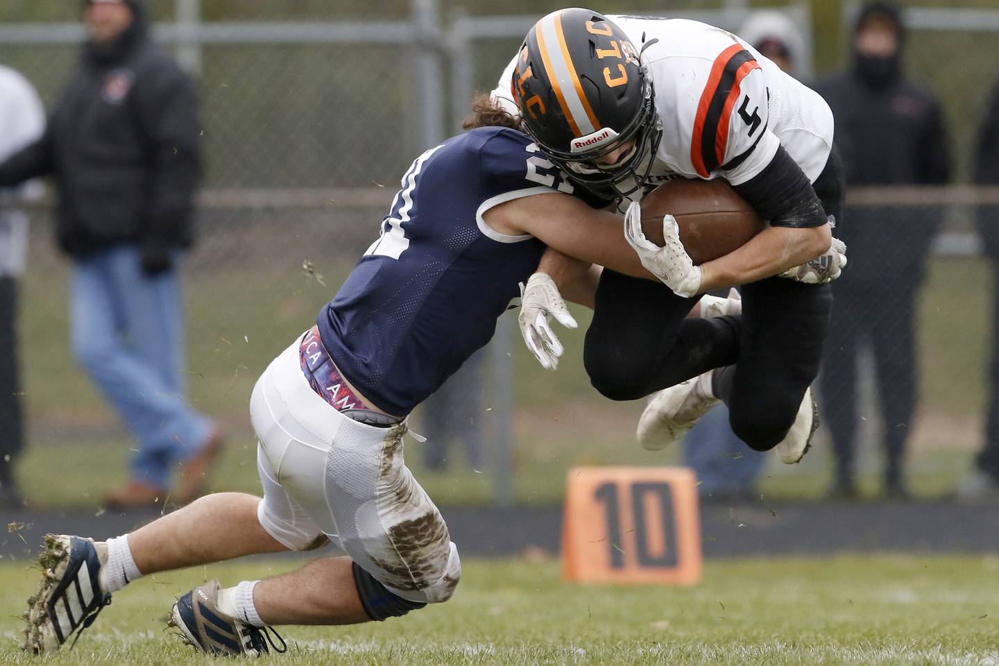 Cary-Grove's Mykal Kanellakis tackle's Crystal Lake Central's Jason Penza during their playoff football game at Cary-Grove High School on Saturday, Nov. 13, 2021 in Cary.  Cary-Grove beat Crystal Lake Central 42-21 and will advance to meet Lake Forest next week.