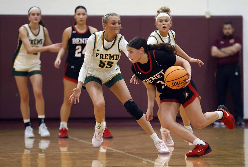 Benet Academy's Aria Mazza (3) tries to keep the ball away from Fremd’s Greta Thompson (55) as time runs short in the fourth quarter during the Montini girls basketball Christmas tournament Saturday, Dec. 28, 2024 in Lombard.