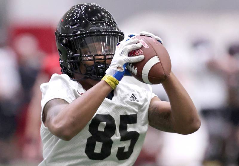 Northern Illinois receiver Trayvon Rudolph catches a pass during the teams first spring practice Wednesday, March 22, 2023, in the Chessick Practice Center at Northern Illinois University in DeKalb.