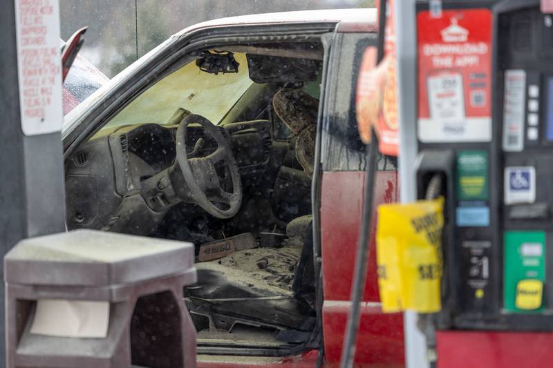 Charred remains of vehicle interior sit at scene of internal electrical fire of vehicle near gas pump on Tuesday, December 30, 2025 at Casey's on 1100 Shooting Park Road in Peru. The fire was extinguished by 15 year old driver Jesus Gonzalez of Streator.