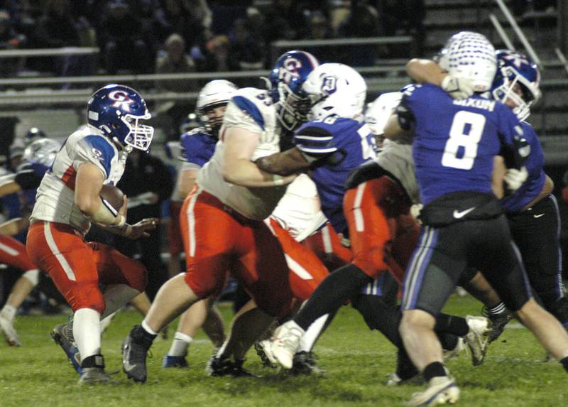 Genoa-Kingston's  Jaden Lee looks for a hole in Dixon's defense. Genoa-Kingston traveled to Dixon to take on the Dukes. The game took place on Dixon's Senior Night, October 24th, 2025