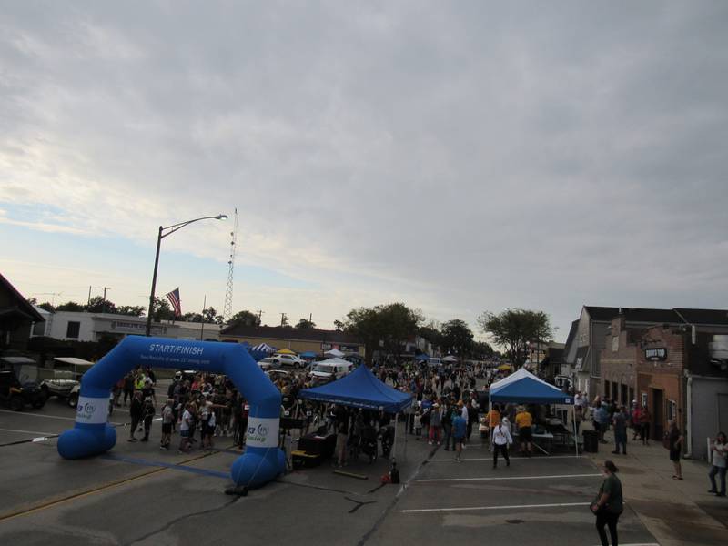 Runners crowd the streets before the Megan's Mission 5K.